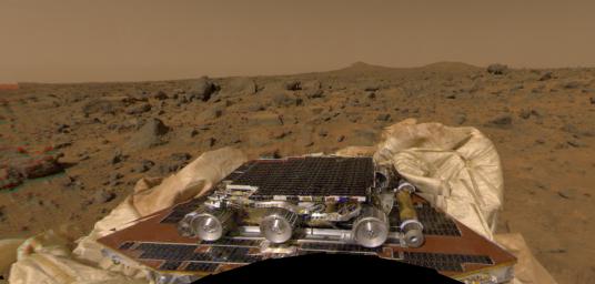 NASA's Sojourner rover and undeployed ramps onboard NASA's Mars Pathfinder spacecraft can be seen in this image, by the Imager for Mars Pathfinder (IMP) on July 4, 1997 (Sol 1). 