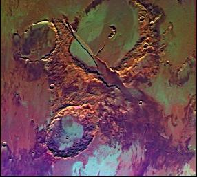 Tharsis-centered volcanic and tectonic activity resulted in the formation of radial grabens of Memnonia Fossae, which cut materials of the ancient cratered highlands and relatively young, highland-embaying lava flows as seen by NASA's Viking Orbiter 2.