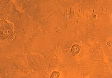 Mars digital-image mosaic merged with color of the MC-9 quadrangle, Tharsis region of Mars. This image is from NASA's Viking Orbiter 1.