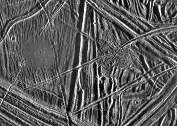 This close-up view of the icy surface of Europa, a moon of Jupiter, was obtained on December 20, 1996, by the Solid State Imaging system on board NASA's Galileo spacecraft during its fourth orbit around Jupiter.