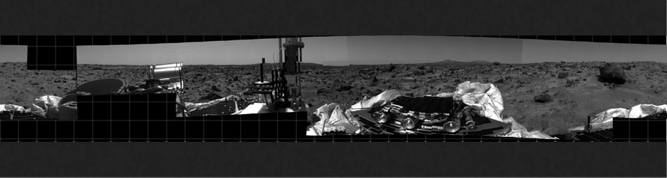 This photomosaic was taken by NASA's Imager for Mars Pathfinder (IMP) camera on July 4, 1997 between 4:00-4:30 p.m. PDT. The foreground is dominated by the lander, newly renamed the Sagan Memorial Station after the late Dr. Carl Sagan.