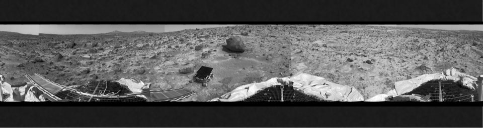 This 360 degree 'monster' panorama was taken by NASA's Mars Pathfinder (IMP) on Sol 3. All three petals, the perimeter of the deflated airbags, deployed rover Sojourner, forward and backward ramps and prominent surface features are visible.