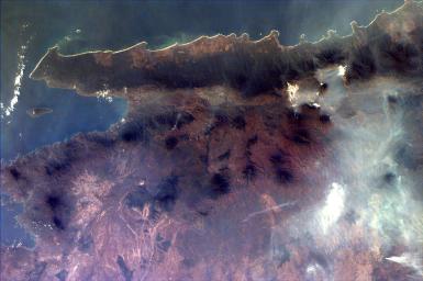 Middle school students across the country photographed the fires and smoke over southern Sumatra from a camera aboard the Space Shuttle Atlantis September 27, 1997.
