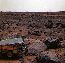 This color image shows NASA's Mars Pathfinder (MPF) Sojourner rover's Alpha Proton X-ray Spectrometer (APXS) deployed against the rock 'Moe' on the morning of Sol 65. This image was taken by NASA's Mars Pathfinder (MPF).