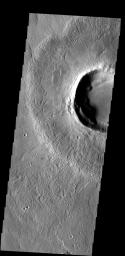 The surface of the ejecta surrounding this crater is scored with fine radial grooves. The grooves were formed during the impact event on Mars as seen by NASA's Mars Odyssey spacecraft.