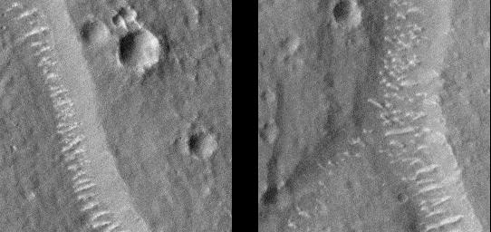 This image taken on August 31, 1998 by NASA's Mars Global Surveyor shows polygon cracks, or troughs, graben formed by faults.