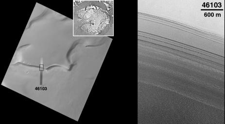 This image from NASA's Mars Global Surveyor taken on July 30, 1998, shows a slope along the edge of the permanent north polar cap of Mars that has dozens of layers exposed in it. 