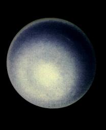 This computer enhancement of a NASA Voyager 2 image, emphasizes the high-level haze in Uranus' upper atmosphere. Clouds are obscured by the overlying atmosphere.
