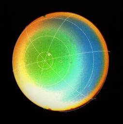 A latitude-longitude grid superimposed on this false color image obtained by NASA's Voyager 2 in 1986 shows that Uranus' atmosphere circulates in the same direction as the planet rotates.