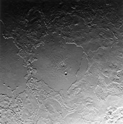 Part of the complex geologic history of icy Triton, Neptune's largest satellite, is shown in this NASA Voyager 2 photo. The photo was received as part of a Triton-mapping sequence in 1989.