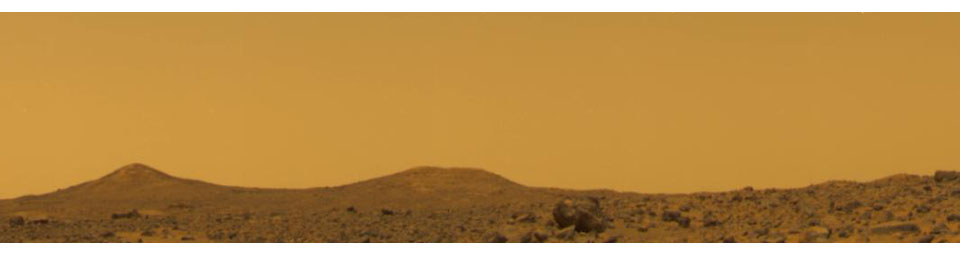 This image from NASA's Mars Pathfinder was taken near local noon on Sol 10, 1997. The color of the Pathfinder's landing site is yellowish brown with only subtle variations.