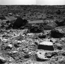 This is the left image of a stereo image pair showing NASA's Sojourner rover in the middle of the afternoon on Sol 66 (September 9). The rover has backed away from the rock 'Moe' after measuring its composition with the Alpha Proton X-Ray spectrometer.