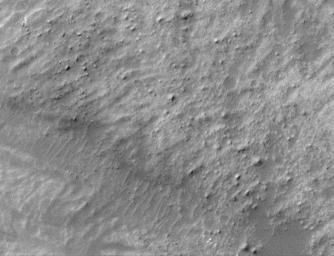 This image from NASA's Mars Global Surveyor shows a field of boulders on the surface of a landslide deposit in Ganges Chasma. Ganges Chasma is one of the valleys in the Valles Marineris canyon system on Mars.