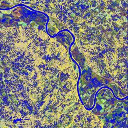 This is a false-color L-band image from NASA's Spaceborne Imaging Radar C/X-Band Synthetic Aperture Radar showing a levee break near Glasgow, Missouri, centered at about 39.2 degrees north latitude and 92.8 degrees west longitude.