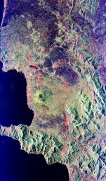 Mt. Vesuvius, one of the best known volcanoes in the world primarily for the eruption that buried the Roman city of Pompeii, is shown in the center of this radar image from NASA's Spaceborne Imaging Radar-C/X-band Synthetic Aperture Radar.
