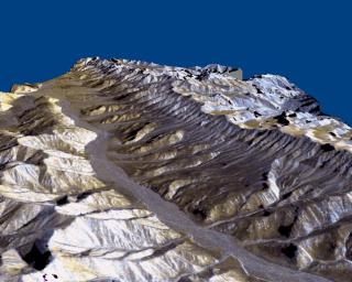 This three-dimensional perspective of the remote Karakax Valley in the northern Tibetan Plateau of western China was created by combining two spaceborne radar images from NASA's Spaceborne Imaging Radar C/X-Band Synthetic Aperture Radar.