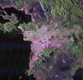 This space radar image from NASA's Spaceborne Imaging Radar-C/X-band Synthetic Aperture of Athens, Greece, shows the sprawling, modern development of this ancient capital city. Densely populated urban areas appear in shades of pink and light green.