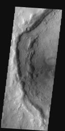 This old crater in Terra Sabaea has patterned floor material that is indicative of having a volitile component. At high latitudes the volitile is most likely ice on Mars as seen by NASA's Mars Odyssey spacecraft.