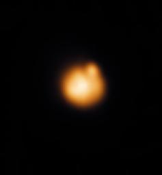 This false-color infrared image of the Sunlit disk of Jupiter's moon Io was taken at the NASA Infrared Telescope Facility at Mauna Kea, Hawaii, a few hours after a November 25, 1999 close Io flyby by NASA's Galileo spacecraft.