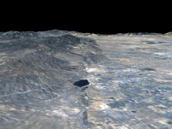 The prominent linear feature straight down the center of this perspective view from NASA's Shuttle Radar Topography Mission is the San Andreas Fault. This segment of the fault lies near the city of Palmdale, CA, about 60 kilometers north of Los Angeles.