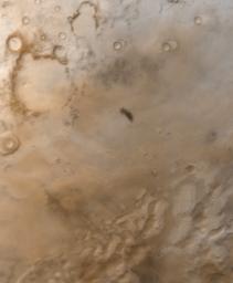 NASA's Mars Global Surveyor shows a vast, frost-coated plain south of Mars' antarctic circle. The icy terrain has an almost pastel-like character, owing to the mixture of reddish dust both on, in, and under the white frost.