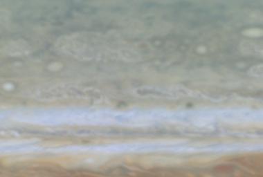 In this frame from a, created from images taken by NASA's Cassini spacecraft, shows a high-latitude area of Jupiter.