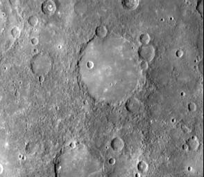 This image, from NASA's Mariner 10 spacecraft which launched in 1974, shows an old basin's hummocky rim is partly degraded and cratered by later events. 