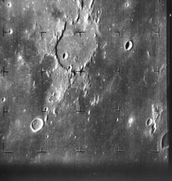 The dark flat floor of Mare Nubium on Earth's Moon dominates most of the image taken by NASA's Ranger 7 on July 31, 1964.
