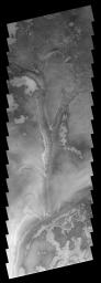 This image captured by NASA's 2001 Mars Odyssey spacecraft shows part of an area just off the margin of the south polar cap on Mars. The bright and dark markings are identical to some seen on the cap, telling us that ice is located at the surface.
