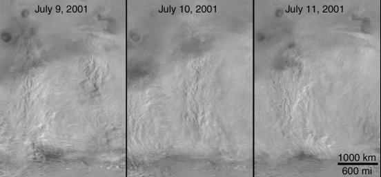NASA's Mars Global Surveyor shows the Daedalia/Claritas/Syria storm dust plumes on Mars revealing a general pattern of regional storm centers beneath an ever-spreading veil of stratospheric dust.