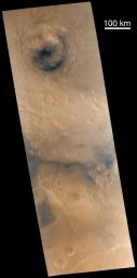 NASA's Mars Global Surveyor shows fretted terrain in mesas and buttes in northern Deuteronilus Mensaeon Mars.