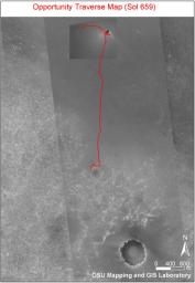 This combined image taken by NASA's 2001 Mars Odyssey, and Mars Global Surveyor, shows the route that Mars Exploration Rover Opportunity had taken its landing site inside 'Victoria Crater' to its position on Dec. 1, 2005.