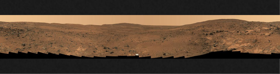 In late November 2005 while descending 'Husband Hill,' NASA's Mars Exploration Rover Spirit took the most detailed panorama so far of the 'Inner Basin,' the rover's next target destination. An abundance of rocks upon red soil is shown.