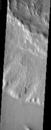 This image from NASA's Mars Odyssey shows a region of Mars' northern hemisphere called Ismenia Fossae. Most of the landforms are the degraded remains of impact crater rim and ejecta from an unnamed crater (75 km diameter) just north of this scene.