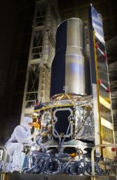 Technicians put final touches on NASA's Space Infrared Telescope Facility at Lockheed Martin Aeronautics in Sunnyvale, Calif., which launched on August 25, 2003. The telescope is now known as the Spitzer Space Telescope.
