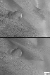 NASA's Mars Global Surveyor shows changes in dark streak patterns caused by wind movement of dust on Mars.