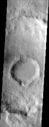 These craters, located in the southern highland heavily cratered terrain, show heavy degradation, most likely caused by the presence of water ice. This image was captured by NASA's Mars Odyssey spacecraft in October 2003.