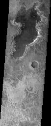 Although well to the northeast of the hematite-bearing unit in Meridiani Planum, this image taken in October 2003 by NASA's Mars Odyssey spacecraft offers a stunning landscape, and clues regarding the possible history of water in this area.