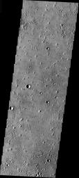 This image from NASA's 2001 Mars Odyssey released on Dec 24, 2003 shows a portion of the Isidis Basin at the center of an elliptical region on Mars.