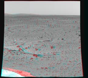 Martian terrain is seen in this 3-D image taken by the panoramic camera on NASA's Mars Exploration Rover Spirit. 3D glasses are necessary to view this image.