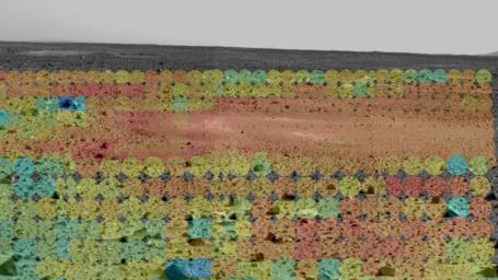 This image shows the martian terrain through the eyes of NASA's Mars Exploration Rover Spirit's mini-thermal emission spectrometer, an instrument that detects the infrared light, or heat, emitted by objects. Red represents warmer regions and blue, cool.