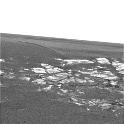 NASA's Mars Exploration Rover Opportunity shows the view of the martian landscape southwest of the rover. The image was taken in the late martian afternoon at Meridiani Planum on Mars