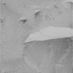 An overhead look at the martian rock dubbed Adirondack captured by NASA's Mars Exploration Rover Spirit where the rover's microscopic imager began its first close-up inspection.