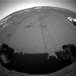 NASA's Mars Exploration Rover Opportunity made its first U-Turn on Mars on Feb. 14, 2004, completing the move of its longest one-day drive, about 9 meters or 30 feet. The rover's tracks are prominent on the martian soil.