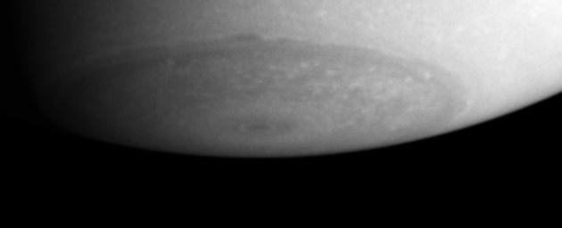 Details observed in Saturn's south polar region demonstrate that this area is far from featureless. This image from NASA's Cassini spacecraft shows lighter colored clouds dot the entire region.