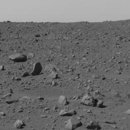 NASA's Spirit used its panoramic camera to capture this view of the rocky terrain just to the left of straight ahead after finishing a drive to the northeast on March 5, 2004. 