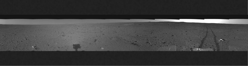 This cylindrical-projection mosaic was assembled from images taken by the navigation camera on the Mars Exploration Rover Spirit on April 24, 2004 at a region dubbed 'site 35.' Spirit is sitting 100 feet away from the northeast rim of 'Missoula' crater.