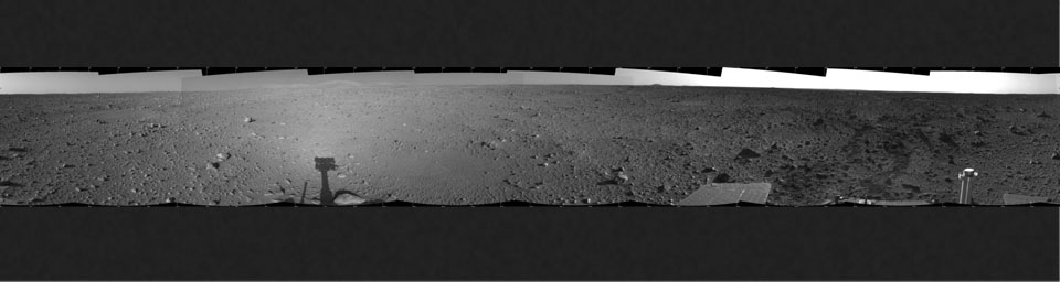 This cylindrical-projection mosaic was created from images that NASA's Mars Exploration Rover Spirit acquired May 8, 2004.The rover was on its way to the 'Columbia Hills,' which can be seen on the horizon.