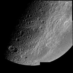 This very detailed image captured by NASA's Cassini spacecraft closest approach to Saturn's moon Dione on Dec. 14, 2004 is centered on the wispy terrain of the moon.