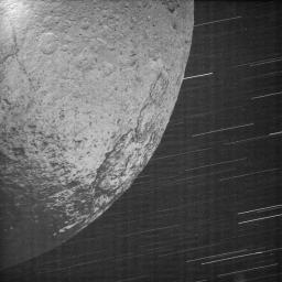 This almost surreal view of Iapetus was acquired by NASA's Cassini spacecraft about 10 minutes after the spacecraft's closest approach to the icy moon during a close flyby on New Year's Eve 2004.